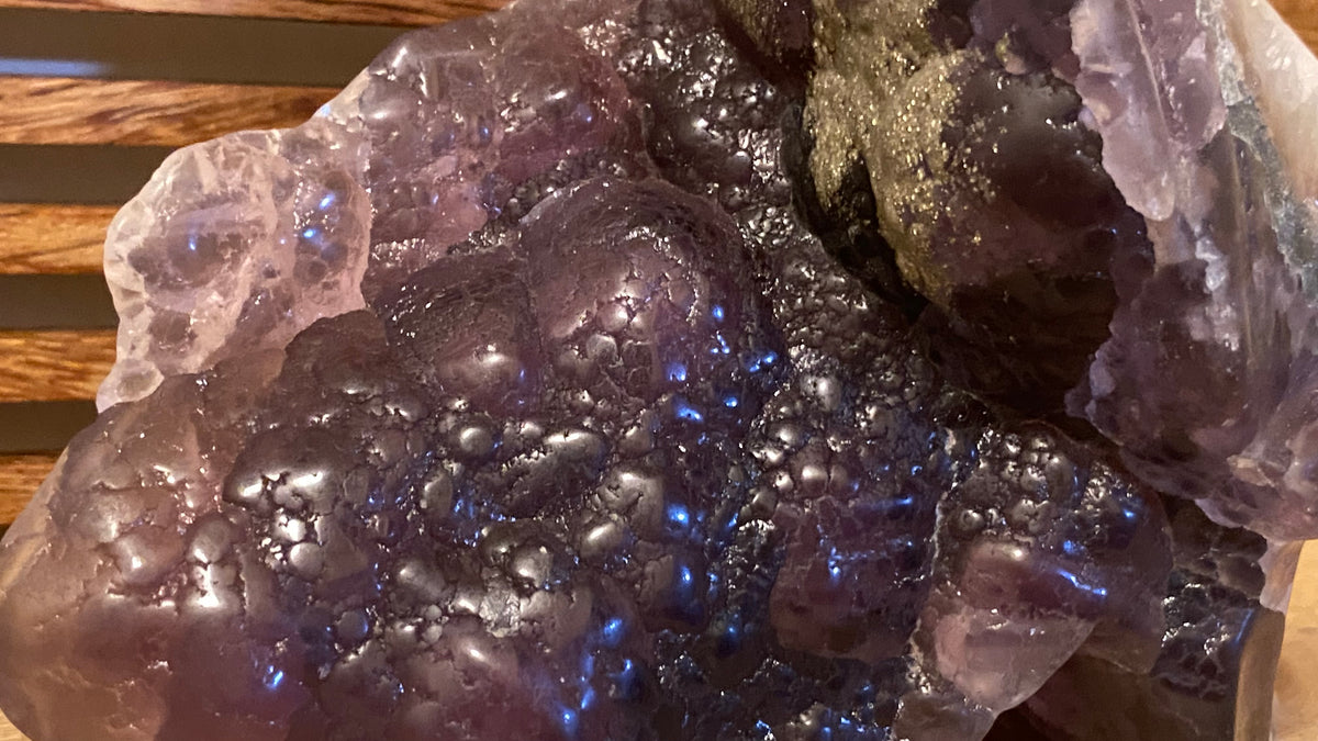 Purple Fluorite Skull w/Feathers